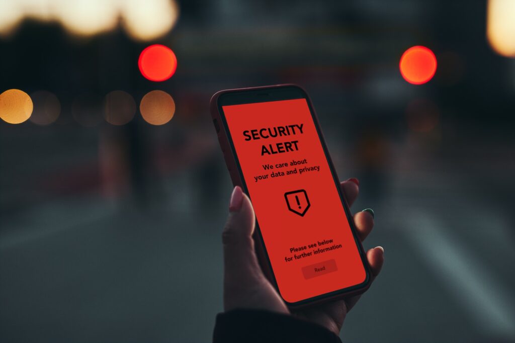 security alert on smartphone screen antivirus warning private data protection system notification